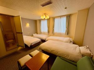 Ένα ή περισσότερα κρεβάτια σε δωμάτιο στο Hotel St. Malte +36 φωτογραφίες