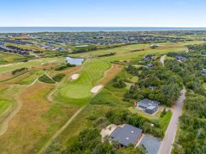 an aerial view of the golf course at the oceanquist estate at Holiday Home Øthger - 1-3km from the sea by Interhome in Ringkøbing