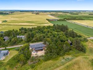 an aerial view of a home with a large house at Holiday Home Øthger - 1-3km from the sea by Interhome in Ringkøbing