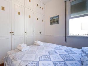 A bed or beds in a room at Apartamento Atlantica Rio