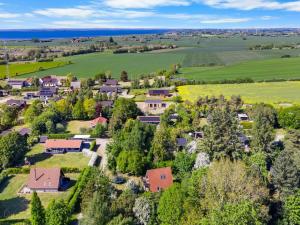 an aerial view of a village with houses and trees at Holiday Home Sunna - 1km from the sea by Interhome in Humble