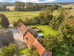 an aerial view of a house with a yard at Holiday Home Har - 1-2km from the sea by Interhome in Sæby +27 photos