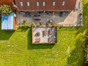 an aerial view of a house with a yard at Holiday Home Har - 1-2km from the sea by Interhome in Sæby