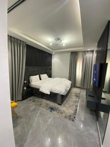 Postel nebo postele na pokoji v ubytování Savvy Residences