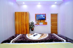 Μια τηλεόραση ή/και κέντρο ψυχαγωγίας στο Hotel Sky inn Agra +4 φωτογραφίες