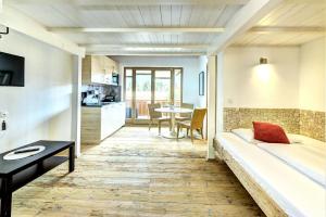 TV a/nebo společenská místnost v ubytování GUT Edelweiss