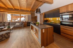 ครัวหรือมุมครัวของ Bachgut, das Resort am Berg - Chalet 3