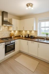 Η κουζίνα ή μικρή κουζίνα στο Entire Luxury Apartment in Milton Keynes