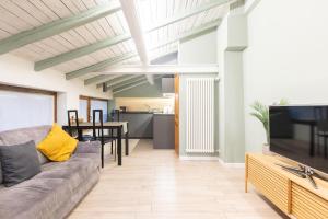 Et tv og/eller underholdning på Everyday Apartments Torre Medioevale