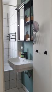 Ένα μπάνιο στο Ferienwohnung Bad Vilbel