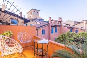 En balkon eller terrasse på Everyday Apartments Torre Medioevale