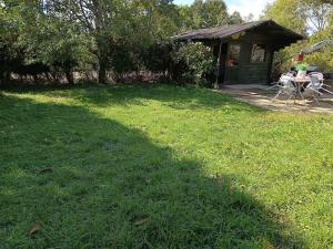 Κήπος έξω από το L'appartement du Golf