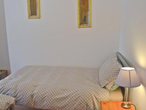 Ένα ή περισσότερα κρεβάτια σε δωμάτιο στο Fawn Lea Apartment +2 φωτογραφίες