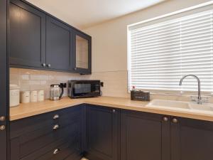 Η κουζίνα ή μικρή κουζίνα στο Sumner Lodge +20 φωτογραφίες