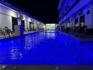 Bazén v ubytování Paradise Resort Pantai Cenang nebo v jeho okolí