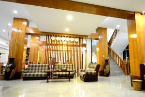 A seating area at UCT Taunggyi Hotel