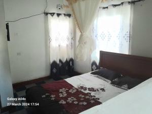 Postel nebo postele na pokoji v ubytování silver garden