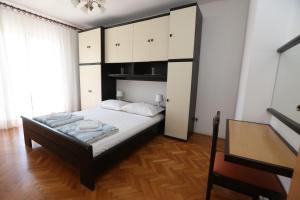 Postel nebo postele na pokoji v ubytování Apartment Davorka