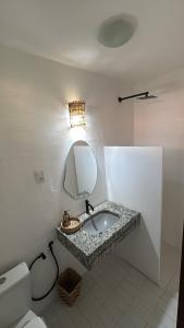 Ένα μπάνιο στο Casa do Kite