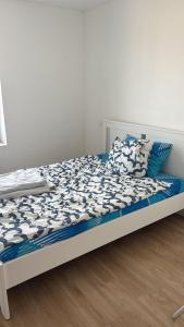 Ένα ή περισσότερα κρεβάτια σε δωμάτιο στο Welcome to your cozy getaway! in saint chamond