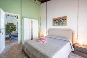 Postel nebo postele na pokoji v ubytování Villa Apollonion