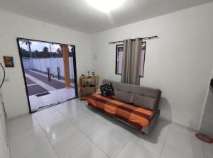 Posezení v ubytování Casa Aconchegante em Manguinhos