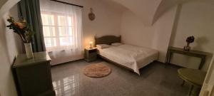 Giường trong phòng chung tại ALTSTADT-Apartmenthaus BOGENSPERGER