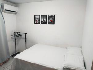 Ένα ή περισσότερα κρεβάτια σε δωμάτιο στο Lindo Apartamento em João pessoa com ar condicionado +33 φωτογραφίες