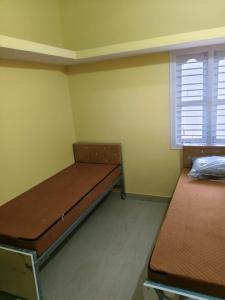 Postel nebo postele na pokoji v ubytování Vybe Hostel