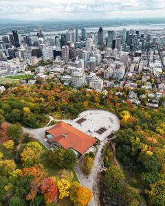 an aerial view of a city with a building at Holiday Inn Express Montreal Airport - St-Laurent by IHG in Montréal