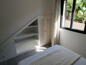 Postel nebo postele na pokoji v ubytování A Casa do Encanto da Ana & Luis