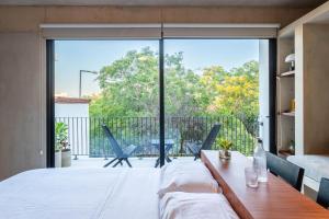 Ένα ή περισσότερα κρεβάτια σε δωμάτιο στο Casa Mangle +17 φωτογραφίες