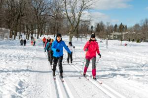 a group of people on skis in the snow at Holiday Inn Express Montreal Airport - St-Laurent by IHG in Montreal