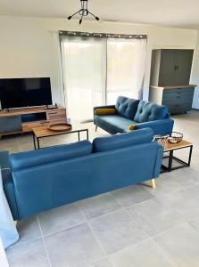 TV a/nebo společenská místnost v ubytování Liledou - Belle Villa De Plain-pied