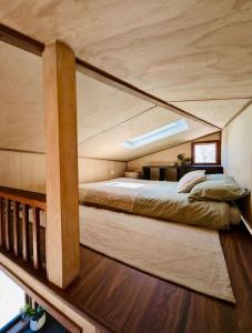 Кровать или кровати в номере Kangaroo Island Coastal Riverside Nature Retreat