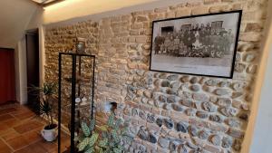a brick wall with a picture on it at Borgo Botol in Gaiarine