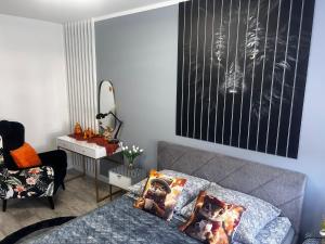 Posezení v ubytování Apartament Ustrzyki Dolne "Dark-Wolf"