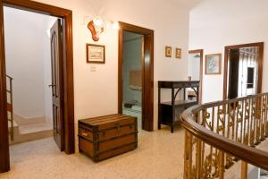 a room with a staircase and aoyer with a stair case at Mediterranean Villa in St. Paul's Bay