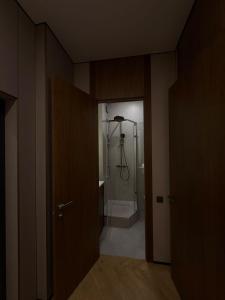 an empty room with a shower in a bathroom at Экспо резиденция in Astana