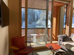 Χώρος καθιστικού στο Flims Stenna Selva