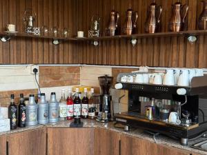 a kitchen with a counter with a coffee machine at منتجع شاطي الاحلام in Yanbu