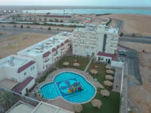 an aerial view of a resort with a swimming pool at منتجع شاطي الاحلام in Yanbu