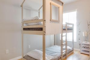 a bunk bed in a room with a mirror at Magic Retreat Orlando in Davenport +23 photos