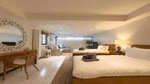 Ένα ή περισσότερα κρεβάτια σε δωμάτιο στο Tropical Poolside Villa - SGB4 +15 φωτογραφίες