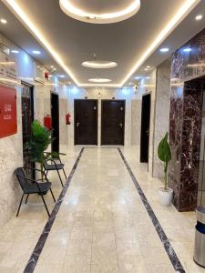 Ο χώρος του λόμπι ή της ρεσεψιόν στο تاج الفخامه للشقق المخدومه إقتصادي