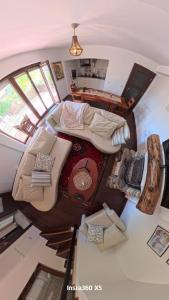 an overhead view of a room with a large bed at Beloviski raj  +22 photos