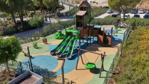 Ο χώρος παιχνιδιού για παιδιά στο Les Bungalows