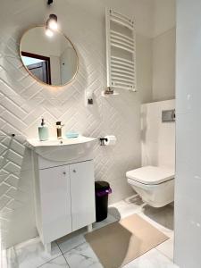 Ένα μπάνιο στο Stacja Łódź Piotrkowska 82 Apartament No3