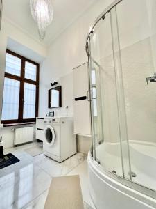 Ένα μπάνιο στο Stacja Łódź Piotrkowska 82 Apartament No3