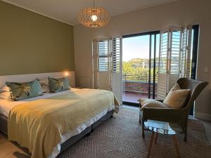 Ένα ή περισσότερα κρεβάτια σε δωμάτιο στο Christiana Lodge